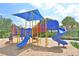 A vibrant playground with slides and various play elements provides a safe and fun environment for children at 477 Orange Cosmos Blvd, Davenport, FL 33837