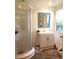 Bathroom featuring a walk in shower, vinyl flooring, and sink at 5019 Pineapple St, Lake Wales, FL 33898