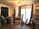 Bedroom with multiple windows for natural light and disorganized belongings at 5019 Pineapple St, Lake Wales, FL 33898
