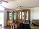 Living room display cabinets offering storage with a glass door to the outside at 5019 Pineapple St, Lake Wales, FL 33898