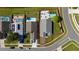 Aerial view of the home, showcasing a pool, patio, yard, and surrounding neighborhood at 5100 Violet Ln, Kissimmee, FL 34758