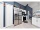 Well-appointed kitchen with stainless steel refrigerator, microwave, and breakfast nook at 5100 Violet Ln, Kissimmee, FL 34758