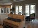 Inviting lounge area with a comfortable sofa and elegant table and chairs, perfect for relaxing and entertaining at 5231 Wildwood Way, Davenport, FL 33837