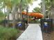 Community water slide with well maintained landscaping at 5231 Wildwood Way, Davenport, FL 33837