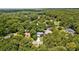 Property showcasing a home nestled within a lush forest, providing serene privacy and natural beauty at 878 Elgin Dr, Winter Springs, FL 32708