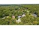 Overhead view of a well-maintained home surrounded by mature trees, creating a private and peaceful environment at 878 Elgin Dr, Winter Springs, FL 32708