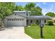 Attractive home with well-kept lawn, solar panels, and a mailbox adding to the curb appeal at 878 Elgin Dr, Winter Springs, FL 32708