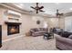 Cozy living room showcasing a fireplace and comfortable seating at 878 Elgin Dr, Winter Springs, FL 32708