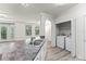 Open kitchen featuring modern sink and countertops, washer/dryer closet, and great natural light at 911 N Orange Ave # 321, Orlando, FL 32801