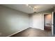 Comfortable carpeted bedroom with closet and doorway, ideal for restful nights and cozy mornings at 1343 Lassen St, Haines City, FL 33844