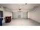 Spacious two-car garage with high ceilings and an automatic door opener at 1343 Lassen St, Haines City, FL 33844