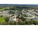 Aerial view of a charming single-story home located in a quiet residential community at 1405 Ashbury Ct, Lakeland, FL 33809