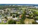 Aerial view of a charming single-story home located in a quiet residential community at 1405 Ashbury Ct, Lakeland, FL 33809