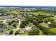 Aerial view of a charming single-story home located in a quiet residential community at 1405 Ashbury Ct, Lakeland, FL 33809