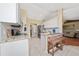 Bright kitchen with stainless steel appliances, subway tile backsplash, and an island at 1405 Ashbury Ct, Lakeland, FL 33809