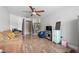 Inviting living room features modern wood-look floors and neutral colored walls at 1405 Ashbury Ct, Lakeland, FL 33809