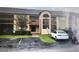 Condominium exterior with assigned parking at 2002 Cascades Blvd # 108, Kissimmee, FL 34741