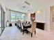 Bright dining area with large windows and seating for eight at 20414 Quinn St, Orlando, FL 32833