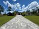 Beautiful modern home with manicured lawn and an inviting entrance at 20414 Quinn St, Orlando, FL 32833