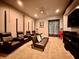 Plush home theater with comfortable seating and dim lighting at 20414 Quinn St, Orlando, FL 32833