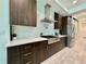 Modern kitchen featuring stainless steel appliances, quartz countertops, and ample storage at 20414 Quinn St, Orlando, FL 32833