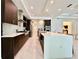 Gourmet kitchen featuring a large island, stainless steel appliances, and plenty of counter space at 20414 Quinn St, Orlando, FL 32833