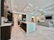 Open concept living room, dining room, and kitchen with modern decor at 20414 Quinn St, Orlando, FL 32833