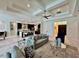 Open concept living room featuring coffered ceilings and direct access to the kitchen at 20414 Quinn St, Orlando, FL 32833