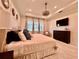 Cozy main bedroom with tray ceiling, plush bedding, and modern decor at 20414 Quinn St, Orlando, FL 32833