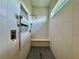 Modern bathroom shower with dual shower heads, built in bench and tile accent shelves at 20414 Quinn St, Orlando, FL 32833