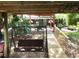 Relax and enjoy the outdoors in the backyard swing with beautiful views of the yard and waterfront at 2082 Starboard Dr, Geneva, FL 32732