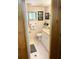 Well-lit bathroom with vanity, toilet, and decorative artwork on the walls at 2082 Starboard Dr, Geneva, FL 32732