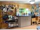 Functional kitchen featuring wood paneling, ample storage, and modern appliances at 2082 Starboard Dr, Geneva, FL 32732