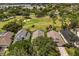 Aerial view of houses backing up to golf course at 2263 Mallory Cir, Haines City, FL 33844