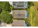 Aerial view of backyard pools, golf course and lush landscaping at 2263 Mallory Cir, Haines City, FL 33844