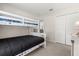 Carpeted ' bedroom with a white bunk bed and a double-door closet at 2263 Mallory Cir, Haines City, FL 33844