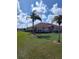 Attractive single-Gathering home with a well-kept lawn and tropical palm tree accents at 2357 Great Harbor Dr, Kissimmee, FL 34746
