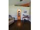 Hallway with unique architectural details and decor, showcasing the home's character and charm at 2357 Great Harbor Dr, Kissimmee, FL 34746