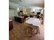 Kitchen and dining area seamlessly flow into the living area in this open floor plan at 2357 Great Harbor Dr, Kissimmee, FL 34746