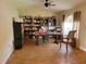 Bright living room with a large window and wood-look tile flooring at 2357 Great Harbor Dr, Kissimmee, FL 34746