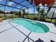 Enjoy this private pool surrounded by lush landscaping within a screened enclosure at 2357 Great Harbor Dr, Kissimmee, FL 34746