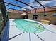 A private screened-in pool offers a refreshing escape, ideal for relaxation and outdoor enjoyment at 2357 Great Harbor Dr, Kissimmee, FL 34746