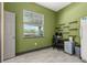 Flex room features a computer desk and window, offering versatility for an office at 2576 R E Byrd Rd, Frostproof, FL 33843