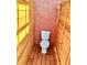 The outside toilet is surrounded by wood walls at 2576 R E Byrd Rd, Frostproof, FL 33843