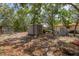 Exterior sheds surrounded by lots of trees and foliage at 2576 R E Byrd Rd, Frostproof, FL 33843