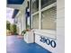Cozy front porch showcasing the house number and stylish details, creating curb appeal at 2900 Wessex St, Orlando, FL 32803