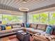 Cozy living room with a large sectional sofa and plush pillows at 2900 Wessex St, Orlando, FL 32803