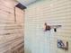Modern shower stall featuring stylish tiling, a rainfall showerhead, and sleek hardware at 2900 Wessex St, Orlando, FL 32803