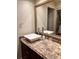 Stylish bathroom vanity with a modern sink and a large mirror at 3100 Parkway Blvd # 417, Kissimmee, FL 34747