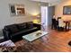 Comfortable living room layout with modern decor and lots of natural light at 3100 Parkway Blvd # 417, Kissimmee, FL 34747